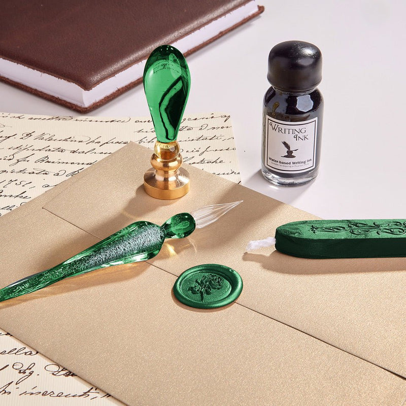 Old-fashioned writing set with dip pen and small ink bottle.