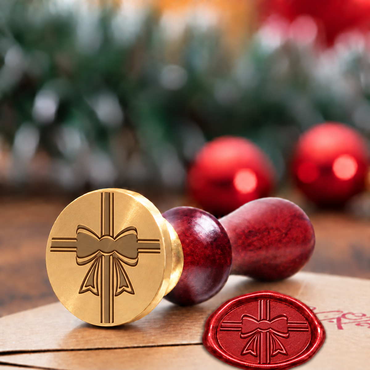Christmas Bow Brass wax seal stamp with a burgundy wood handle