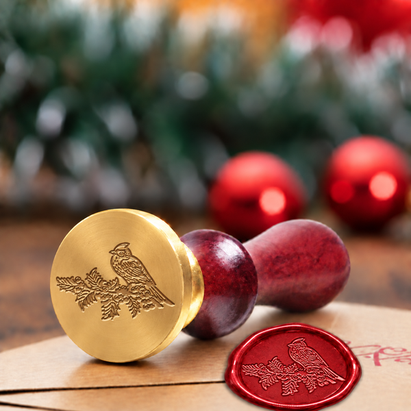 Winter Cardinal wax seal stamp with a burgundy wood handle