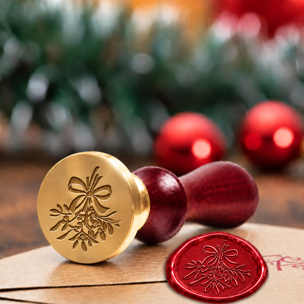 Mistletoe wax seal stamp with a burgundy wood handle