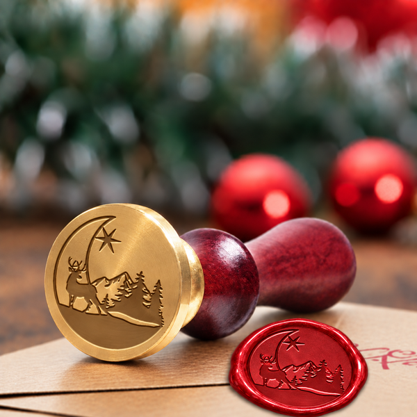 Tis the season wax seal stamp with a burgundy wood handle"